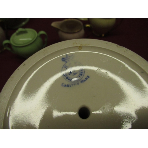 164 - Carlton Ware yellow coffee pot, Carlton Ware green tea pot with relief molded flowers, three Carlton... 