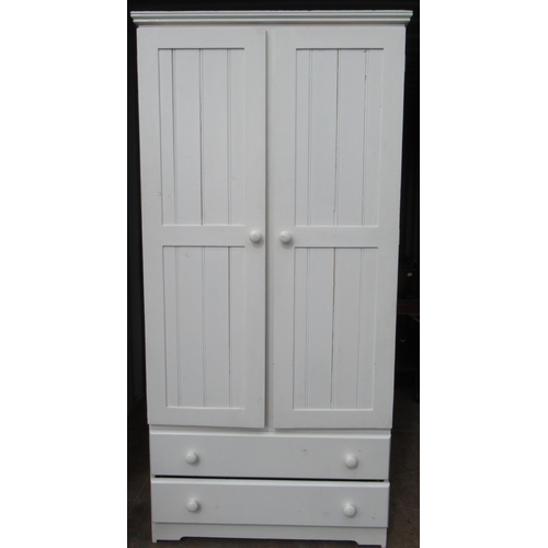 205 - White painted pine wardrobe with two doors above two drawers W80cm D55cm H185cm, and a rectangular m... 