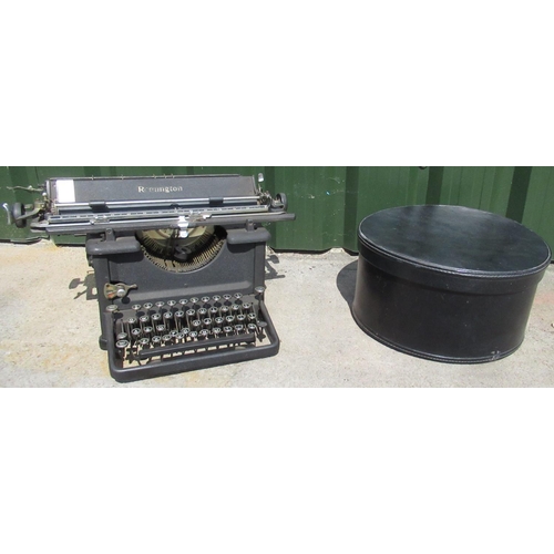 179 - Jon Culshaw Collection - Remington desktop type writer, black textured case with Querty keyboard W49... 