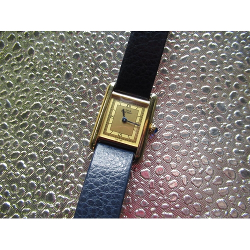 19 - Ladies Cartier Argent quartz gold plated wristwatch, rectangular case on later blue leather strap, t... 