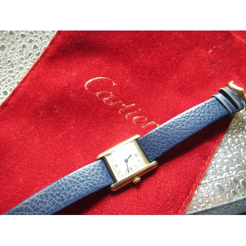19 - Ladies Cartier Argent quartz gold plated wristwatch, rectangular case on later blue leather strap, t... 