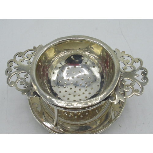 90 - Edw.VII hallmarked silver tea strainer on stand with ball feet Sheffield 1906 and 1908, 2.4ozt