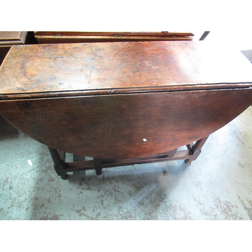 417 - C18th oak gateleg dining table with two 'D' shaped  leaves and end drawer, on gun barrel turned and ... 