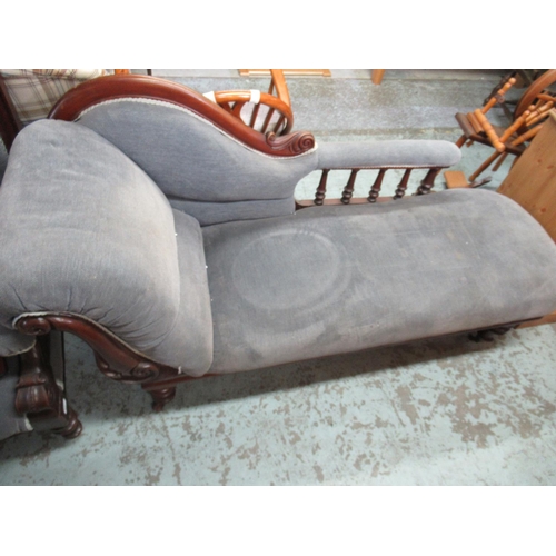 424 - Victorian mahogany framed chaise longue with scroll and baluster turned raised back on tuned support... 