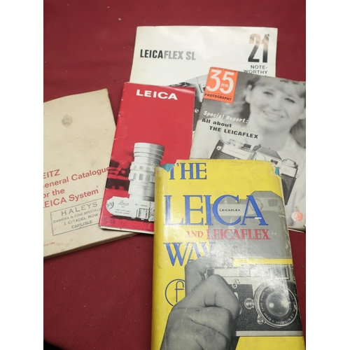 404 - Small selection of books including: Leitz general catalogue for the Leica date June 1966 with stamp ... 