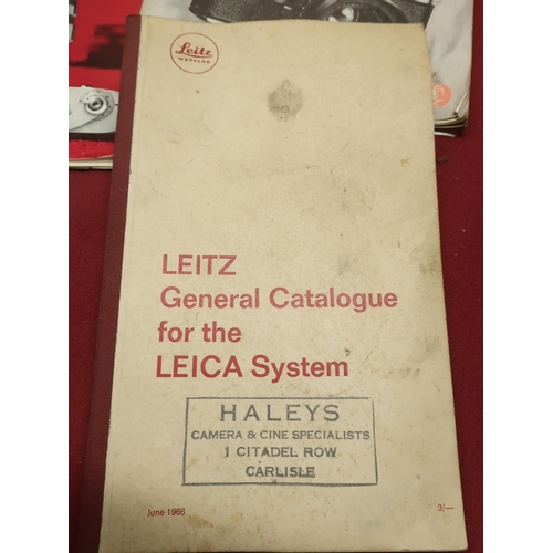 404 - Small selection of books including: Leitz general catalogue for the Leica date June 1966 with stamp ... 