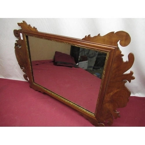 87 - C20th Chippendale style mahogany fret carved wall mirror carved gilt in a border W51cm H79.
5cm