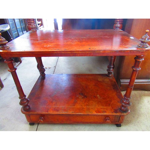 372 - Victorian two tier walnut What not table on turned supports, with one drawer and turned finials W58c... 