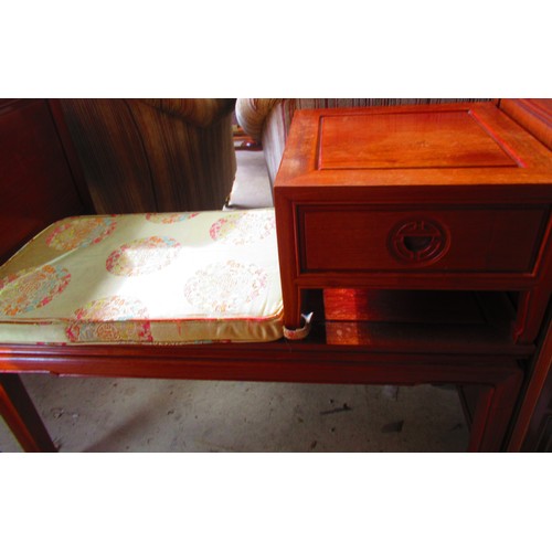 377 - Chinese style hardwood telephone table with carved front drawer on square supports with cushion