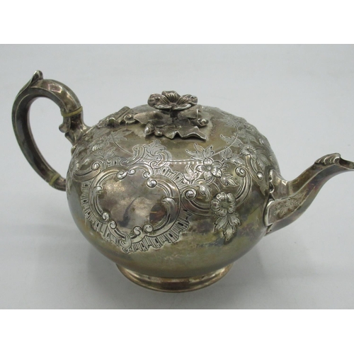 2087 - Victorian hallmarked silver bullet shaped teapot, decorated with scrolls, foliage and cartouche, flo... 