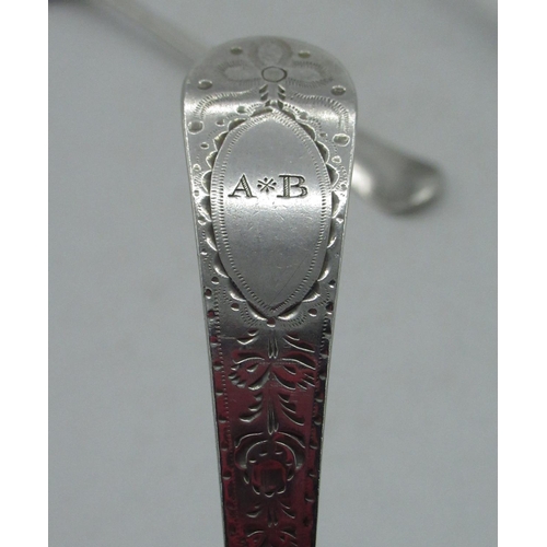 2110 - Geo.III hallmarked silver shell back Old English pattern table spoon, engraved with initial E.M, L21... 