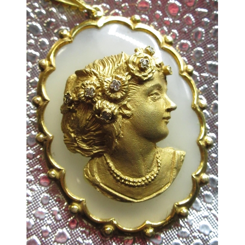 2129 - Edwardian 9ct gold hallmarked and chalcedony oval cameo pendant, the girl with five diamond set hair... 