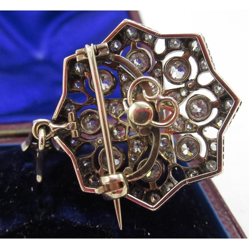 2127 - Victorian star brooch/pendant set with 54 bright cut diamonds, set in white metal backed with yellow... 
