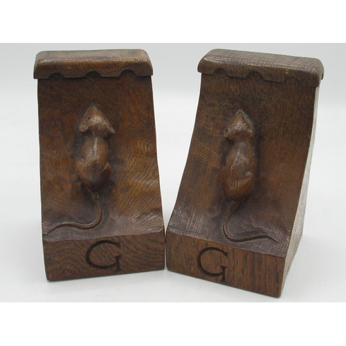 2025 - Robert Mouseman Thompson - pair of adzed oak book ends with penny moulded tops, both carved with ini... 