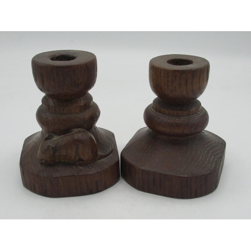 2043 - Robert Mouseman Thompson - pair of turned oak dwarf candlesticks, tapering octagonal bases carved wi... 