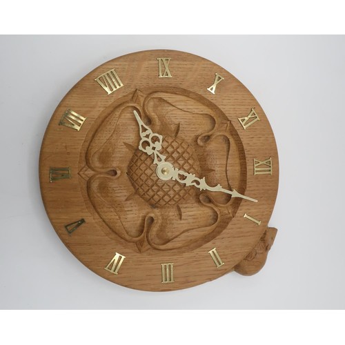 2072 - Colin Beaverman Almack - circular oak wall clock with a central carved Yorkshire Rose and brass Roma... 