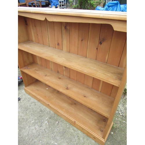 514 - Set of pine two tier open bookshelves with shaped cornice and panelled back on plinth base W122cm D2... 