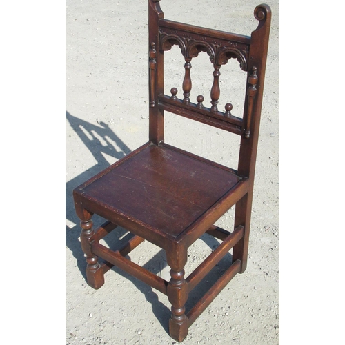 2325 - Charles II style oak back stool, baluster and arcade carved back with scroll cresting, solid seat on... 