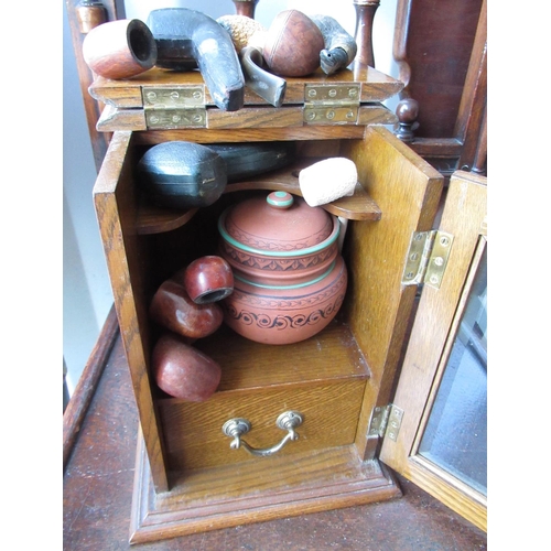 2289 - Edwardian oak smokers cabinet, fitted interior with pottery tobacco jar and cover above a single dra... 