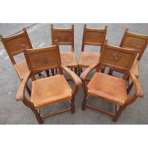 2067 - Thomas Gnomeman Whittaker - set of six oak dining chairs, solid panel backs carved with the arms of ... 