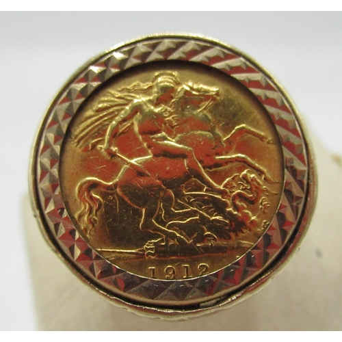 523 - Rav Wilding Collection - Geo. V 1912 gold half sovereign ring in 9ct gold mounts with scroll detail