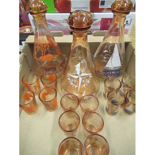 88 - 1951 Festival of Britain amber tinted seven piece liquor set, and two other liquor sets