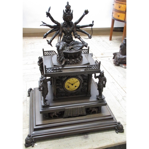 2135 - Large early C20th bronze clock surmounted by the Goddess Durga seated upon the galleried roof of a H... 
