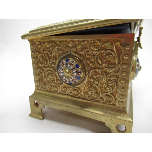 2131 - Victorian gilt brass rectangular jewellery casket, all over relief decorated with scrollwork and col... 