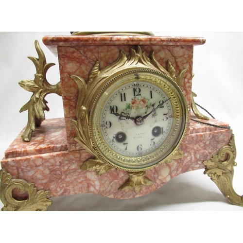 2139 - Early C20th gilt metal mounted salmon pink marble mantel clock, surmounted by a spelter model 'Cueil... 