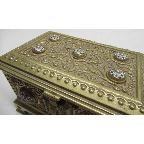 2131 - Victorian gilt brass rectangular jewellery casket, all over relief decorated with scrollwork and col... 