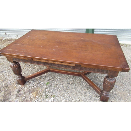 2320 - C17th style oak extending dining table, planked top with two draw leaves, lunette carved frieze on c... 