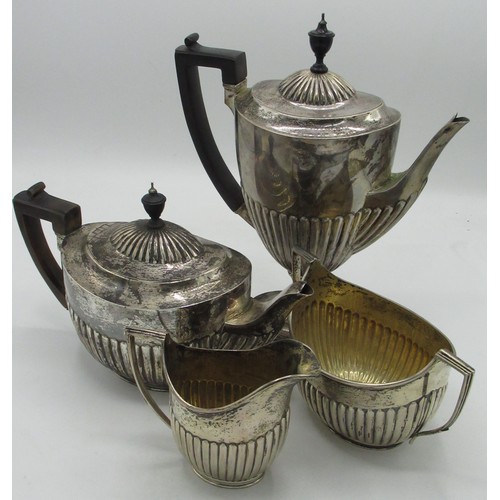 2081 - Victorian hallmarked silver four piece tea service, with part lobed ovoid bodies, tea pot and hot wa... 