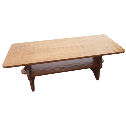 2075 - Thomas Gnomeman Whittaker - an oak two tier coffee table with rectangular adzed top and under tier o... 