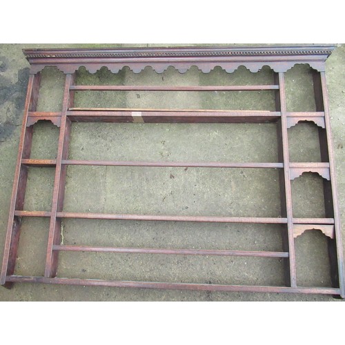 2318 - Geo. III oak four tier open Delft rack with dentil cornice and shaped frieze W160cm D13cm H122cm