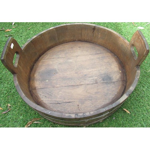 2359 - Oak coopered jardinière with two pierced handles and polished metal bands D55cm H22cm