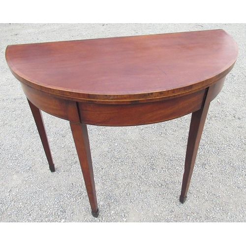 2351 - George III rosewood banded and boxwood strung mahogany folding tea table, on twin gate action square... 