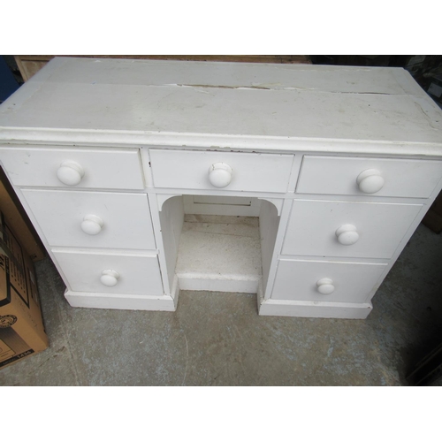 152 - White painted Victorian pine knee hole desk with three drawers above two drawers and a recess on pli... 