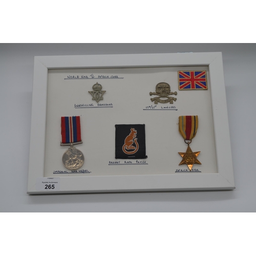 265 - Two framed and mounted WWII British war medal displays: one with desert rat TRAF patch, war medal an... 