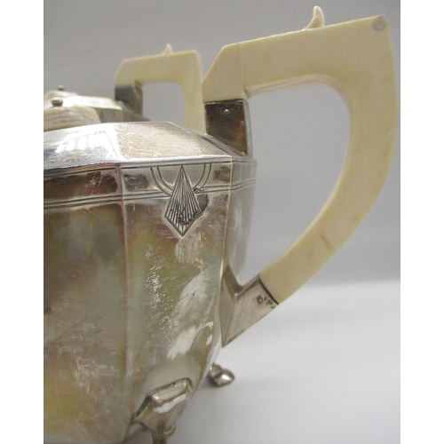 36 - Geo. VI Art Deco design silver four piece tea set. Comprising of a coffee pot, teapot with angular i... 