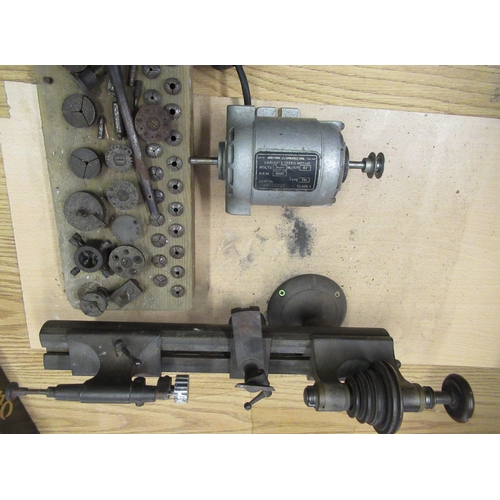 570 - Early C20th watch makers lathe with associated collets, complete with electric motor and foot contro... 