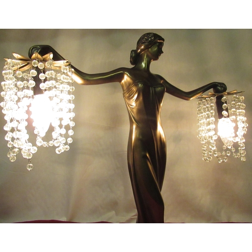 60 - C20th Art Deco style bronzed table lamp in the form of a female figure in a long dress with outstret... 