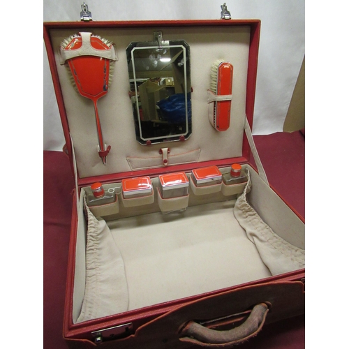 66 - Art Deco period ladies travelling vanity case embossed red rexcine case with chrome plated fittings,... 