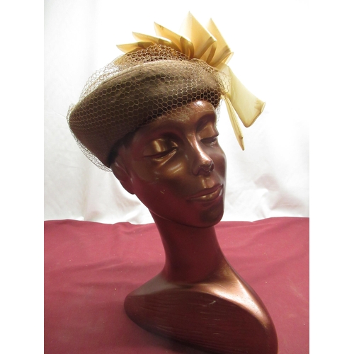 67 - 1950's composition ladies milliners display in copper finish H47cm