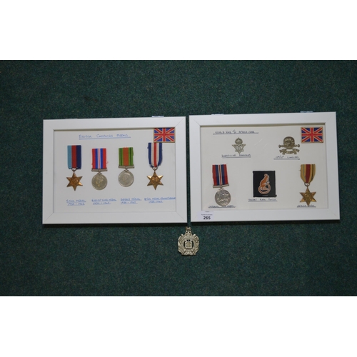 265 - Two framed and mounted WWII British war medal displays: one with desert rat TRAF patch, war medal an... 