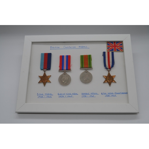 265 - Two framed and mounted WWII British war medal displays: one with desert rat TRAF patch, war medal an... 