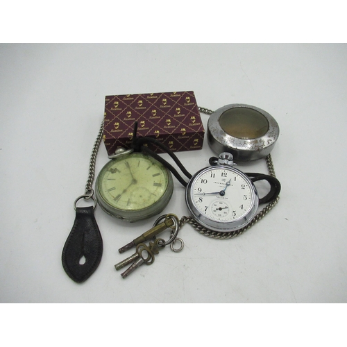 225 - Ingersoll top wind open faced pocket watch, metal cased pocket watch, three watch keys and a tie cli... 