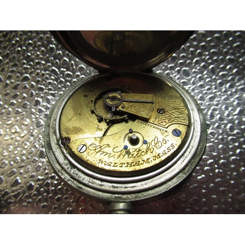 225 - Ingersoll top wind open faced pocket watch, metal cased pocket watch, three watch keys and a tie cli... 