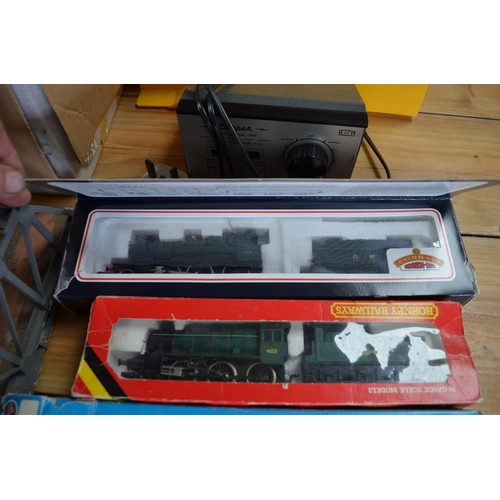 212 - Selection of OO gauge model railway including 4 engines by Bachmann, Hornby and Airfix, station buil... 