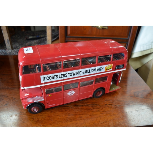 214 - Tin double decker model bus