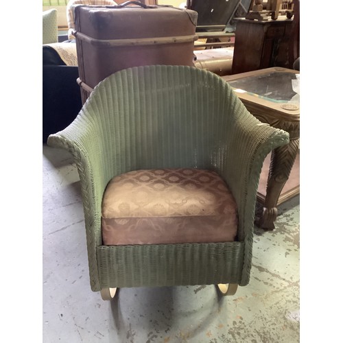 130 - Lloyd Loom sprung rocking chair with upholstered drop in seat